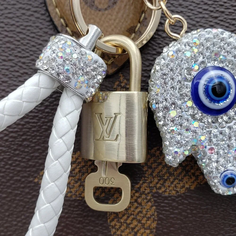Authentic Louis Vuitton Lock & Key with unbranded Evil Eye Bagcharm